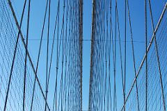 16 Spider Web Wires Lead From The First To The Second Cable Tower On The Walk Across New York Brooklyn Bridge